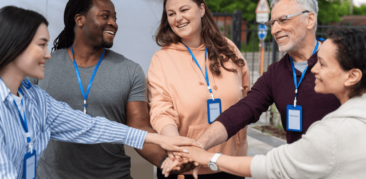 Nonprofit leaders and board members discussing board member fundraising, board giving requirements, and overall board fundraising expectations during a meeting.